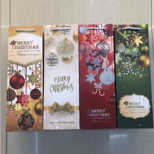 Пакет новорічний паперовий під пляшку "Merry Christmas" 12*10*36см Stenson R32989