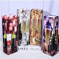 Пакет новорічний паперовий під пляшку "Champagne's splash" 12*9*35см Stenson R33082