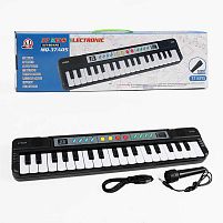 Синтезатор MQ 37 A05 Штрихкод=97152 37 клавіш, ефекти, мікрофон, регулювання гучності, мелодії, запис та відтворення звуків, працює від мережі