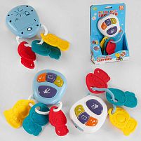 Музичне брязкальце 22450 TK Group", 2 кольори, ОЗВУЧ. УКРАЇНСЬКОЮ МОВОЮ, підсвічування, звук, пісня, віршик, мелодія, 3 прорізувачі, в коробці